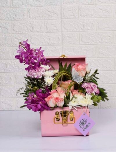 Fresh Flowers Flower metal trunk arrangement of Jumilia, Carnation & purple orchids