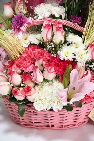 Basket Arrangements Flower Arrangement Of Jumilia Roses, Light Pink Carnation With Congratulation Balloon