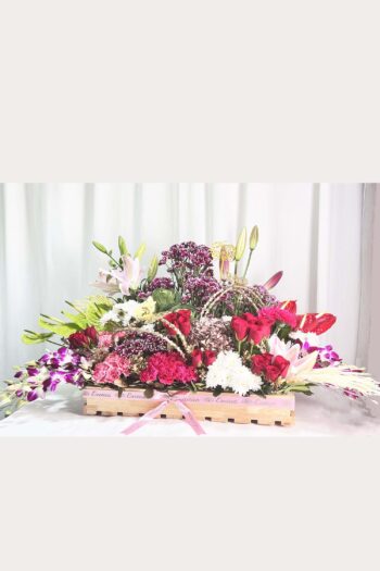 Fresh Flowers Flower Arrangement Of Red Roses, Purple Daisy, Lily, Brassica, With Supari Mocha