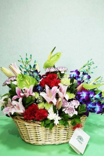 Basket Arrangements Basket Arrangement Of Red Roses & Green Anthurium with Blue Orchids