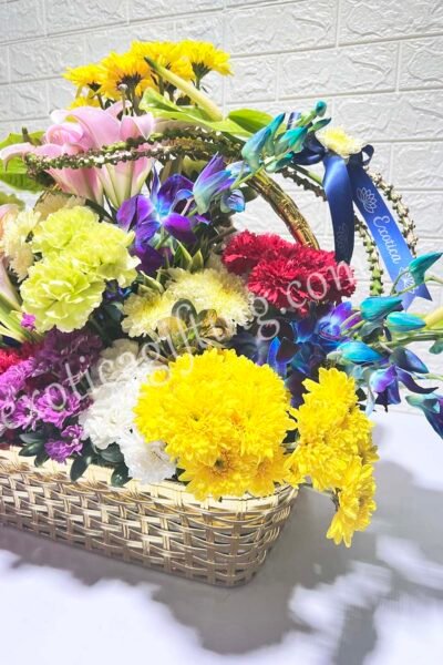 Basket Arrangements Basket of Yellow Daisy & Blue Orchids With Pink Flowers in Golden Basket.