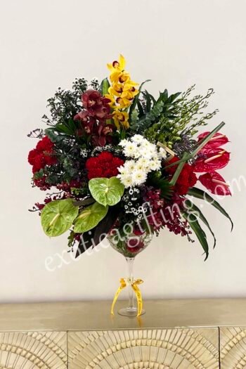 Fresh Flowers Flower Arrangement of Red & Green  Anthurium & Red  Carnations With Red & Yellow Mokara .
